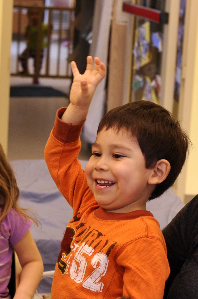Hands Up Excited preschoolers repeat new Hǝn̓q̓ǝmin̓ǝm̓ words. Photo: Kendall Walters